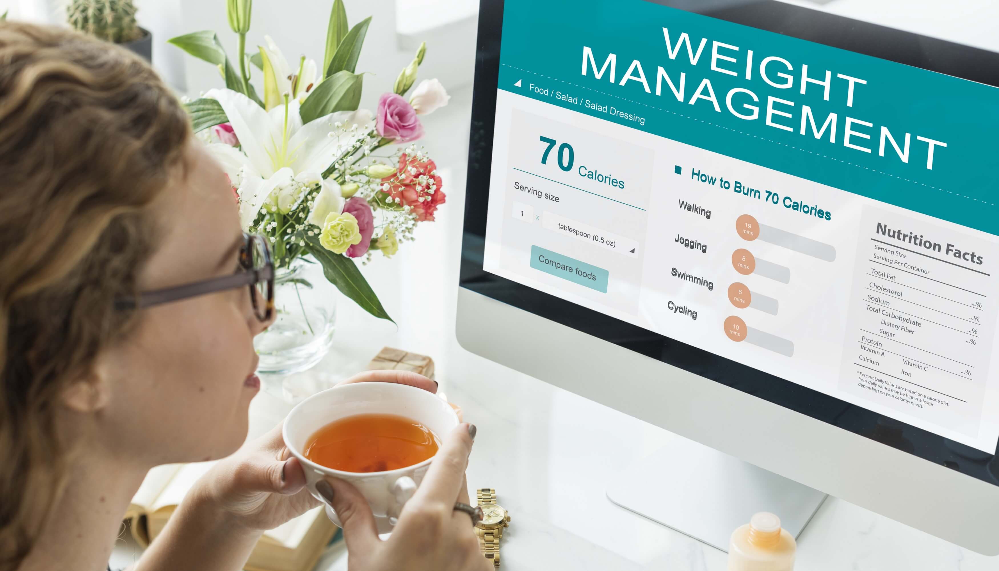 Image of woman tracking BMI on web portal
